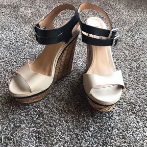 Tans and black cork like wedge